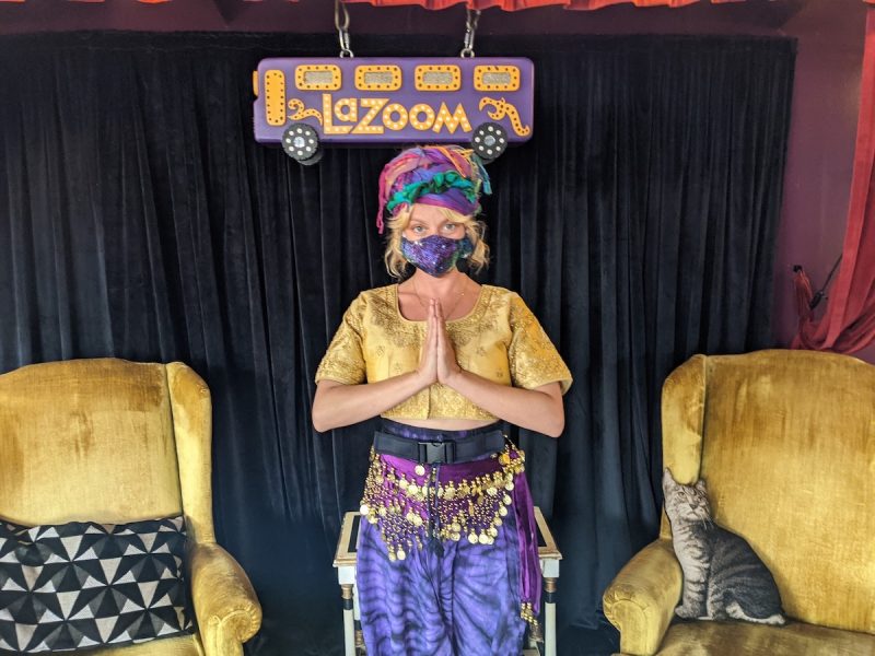 Tour Guide in LaZoom Room wearing a mask.